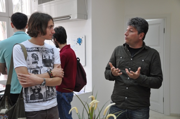 Giorgio talking with an entrepreneur, at The Hive